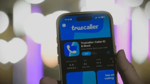 Truecaller app identifying unknown caller and spam number on smartphone